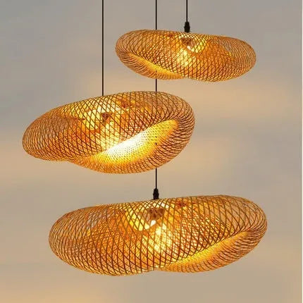 Woven bamboo straw hat-shaped hanging chandelier lamp showing natural texture and light diffusion.