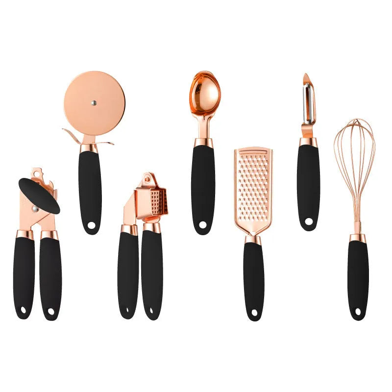 7-piece stainless steel kitchen tool set with copper plating peeler gadget in a cutlery rack on a countertop