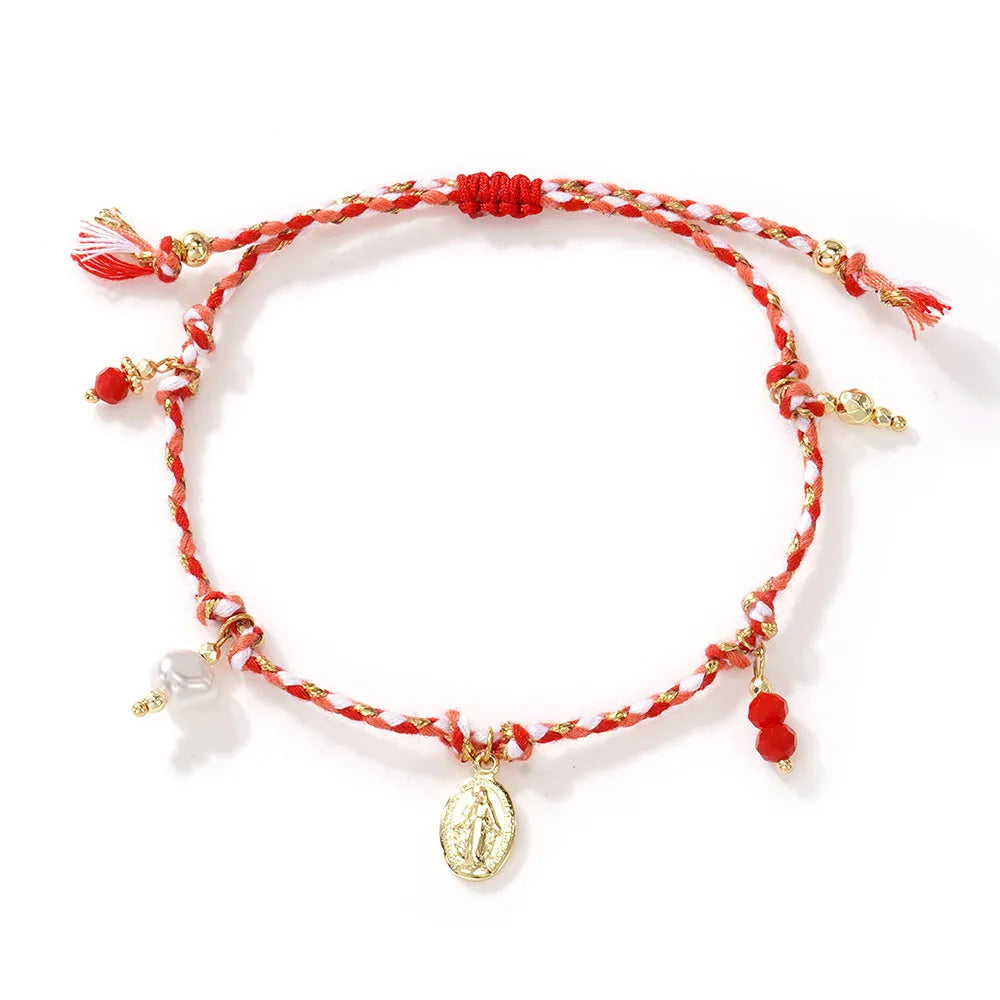 Ethnic style women's bracelet handmade from colourful braided rope with woven carrying strap tag design