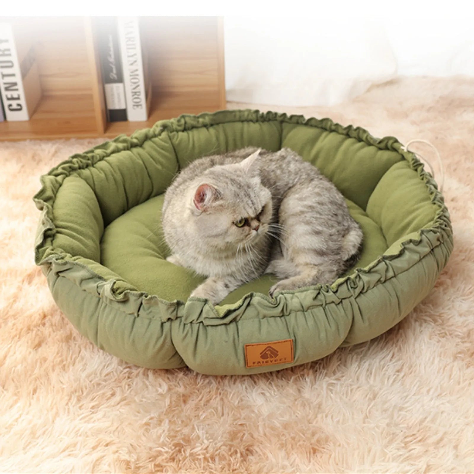 Grey and green reversible donut-shaped pet bed for cats and dogs, shown in small, medium, and large sizes.
