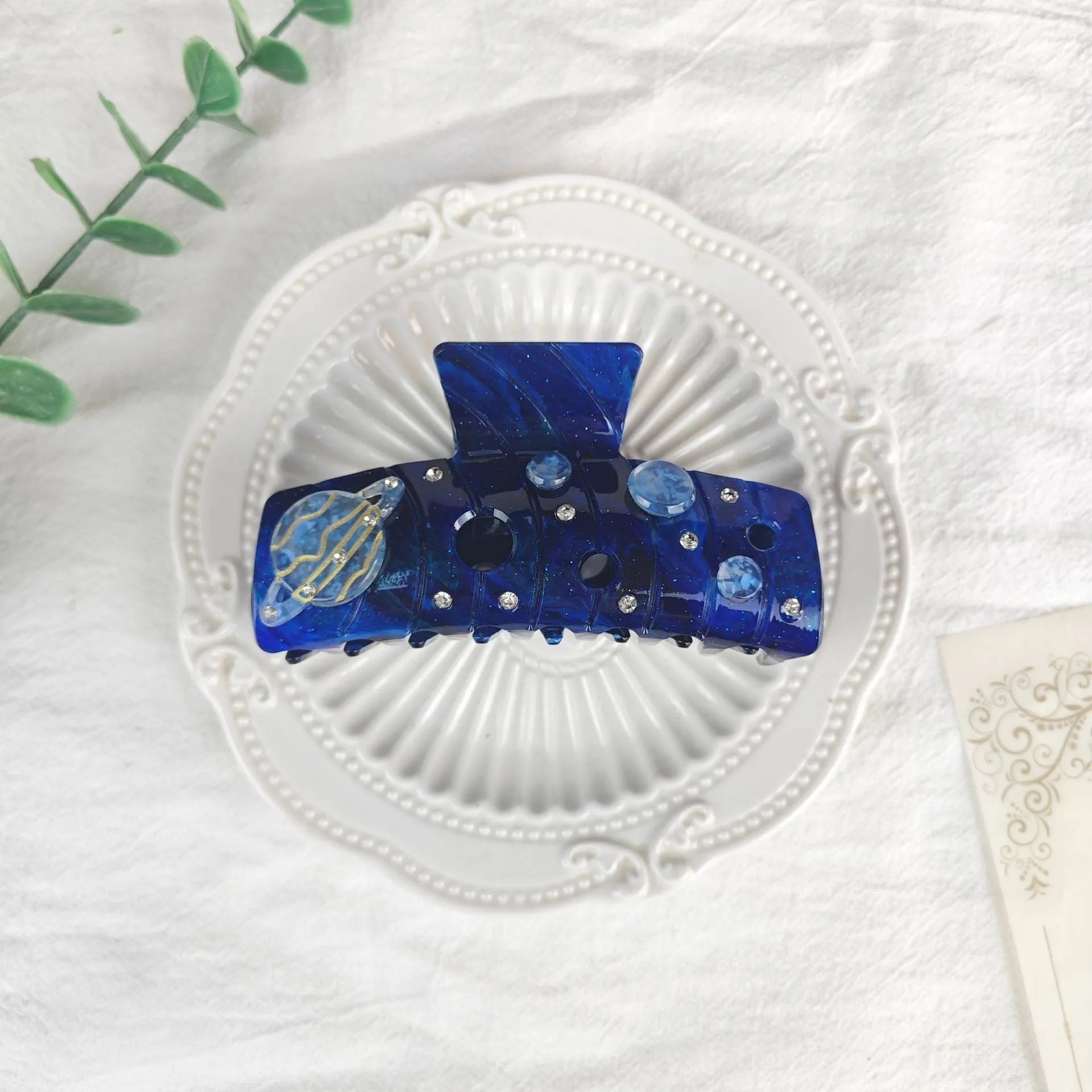 Women's oversized barrette with starry sky pattern in cellulose acetate sheet material