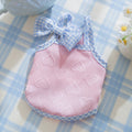 Small dog wearing heart pattern bow suspenders vest with matching hairband in Bondi Blue colour