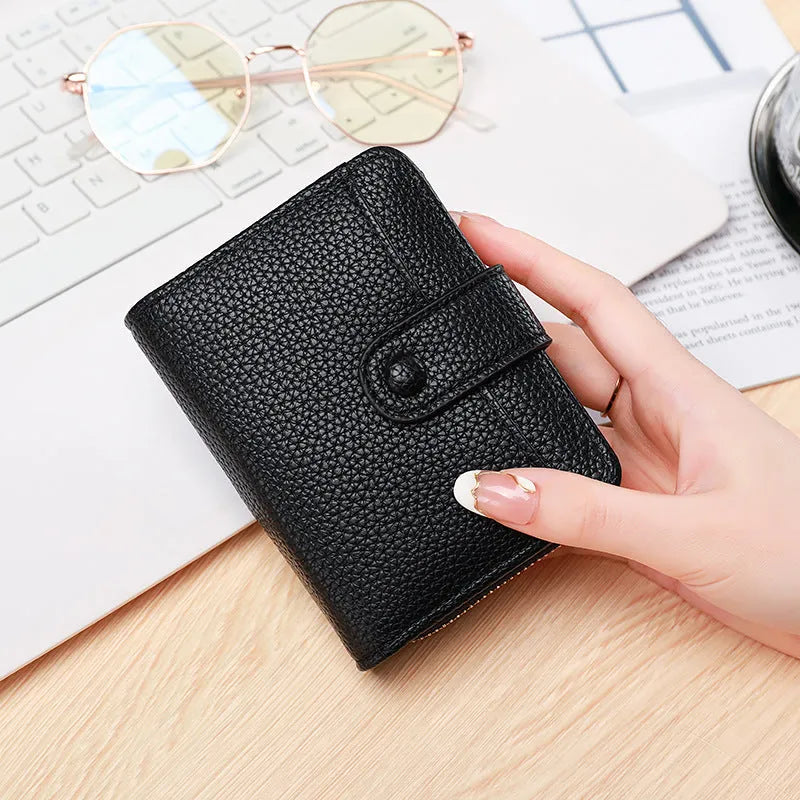 Ladies short wallet with lychee pattern in two-fold design showing four colour options