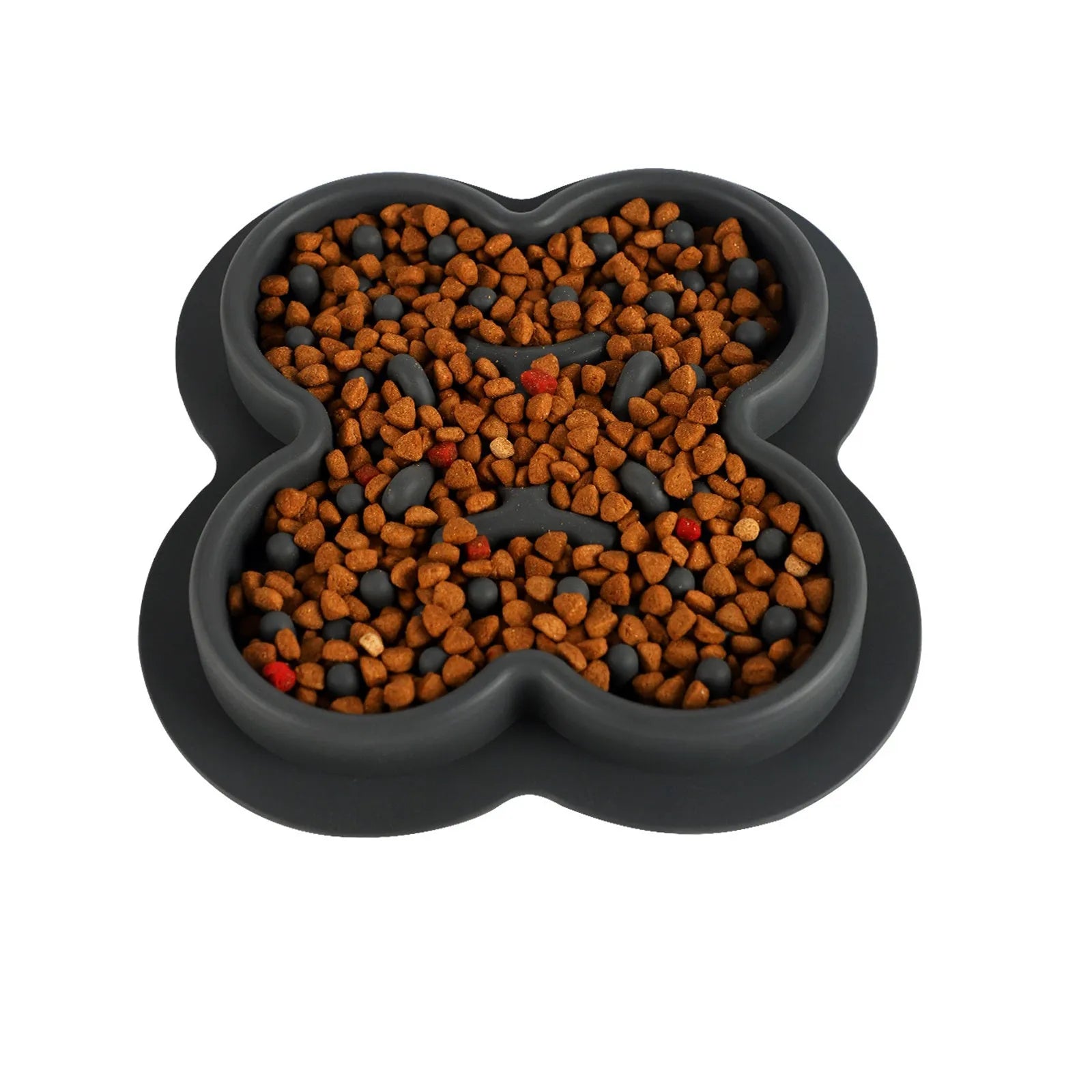 Silicone pet licking pad slow feeder in green colour on kitchen floor