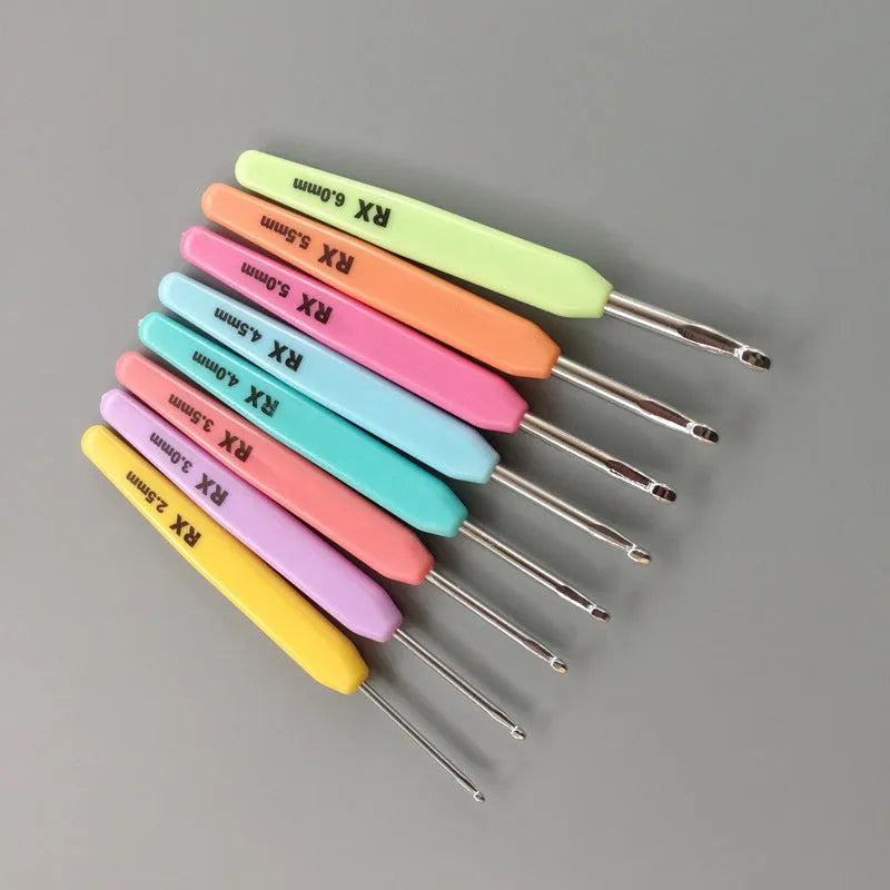 Set of 16 crochet hooks with soft plastic handles in storage bag