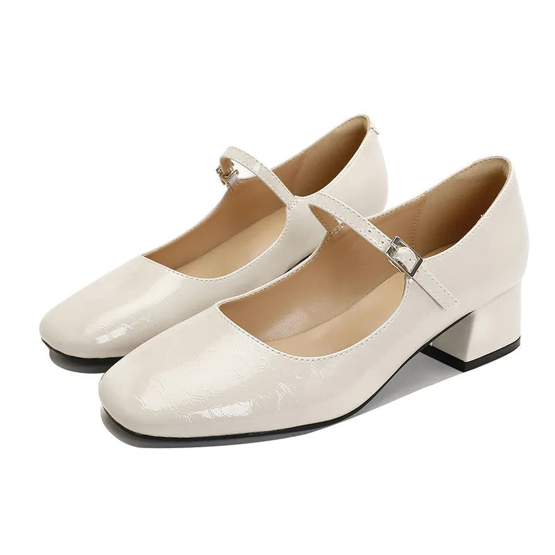 Women's square toe patent leather Mary Jane shoes with buckle and pearl detail, mid heel, black colour