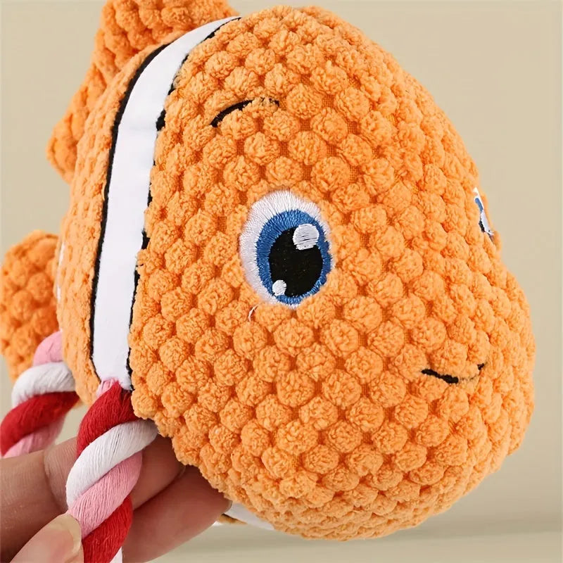 Turtle-shaped plush dog chew toy with rope core in grey, green and orange colour options