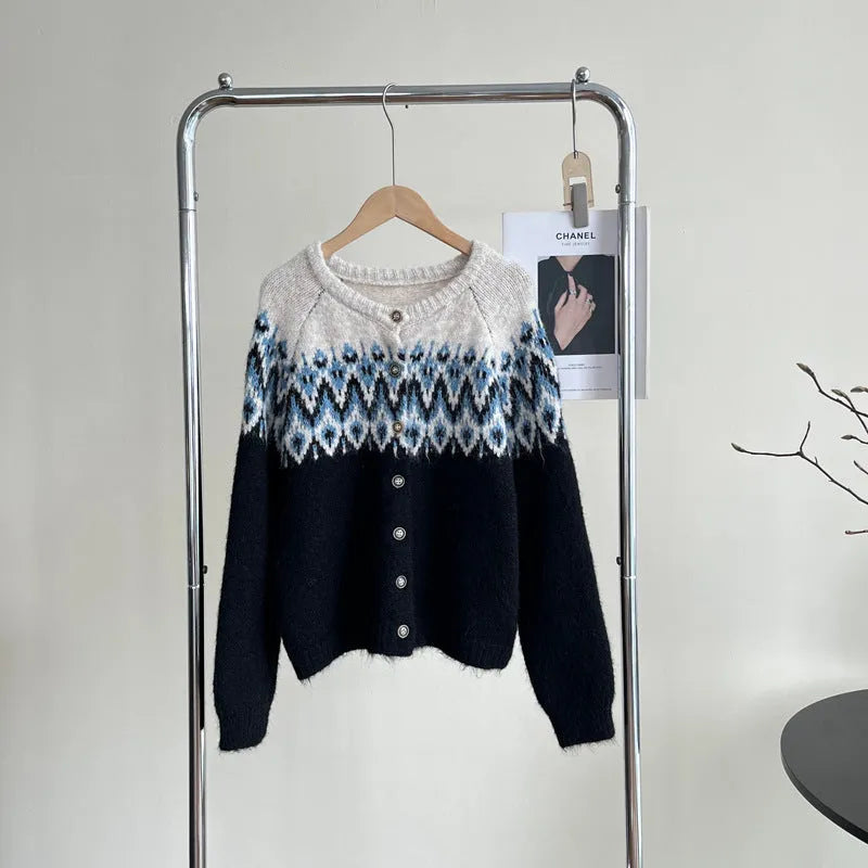 Women's brown jacquard patterned sweater coat with a loose fit and long sleeves.