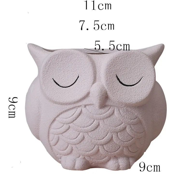 Handmade frosted ceramic owl flower pot in light pink for small succulents.