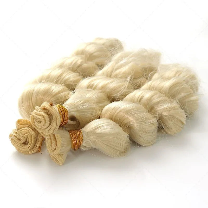 Golden long synthetic wig for women on a stand, showing hair weft construction