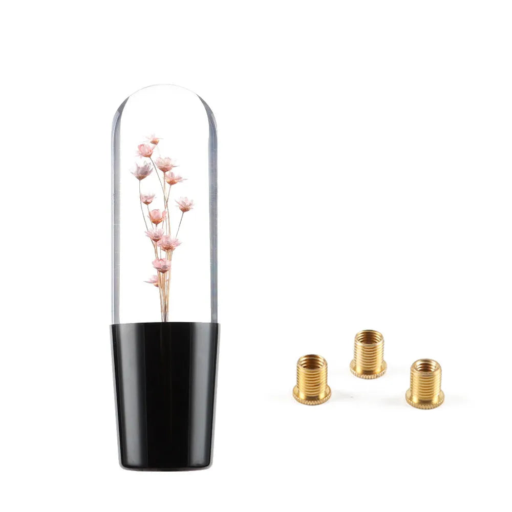 JDM crystal car gear knob with flower-in-water design, 15cm long, shown with three fitting adapters