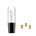 JDM crystal car gear knob with flower-in-water design, 15cm long, shown with three fitting adapters