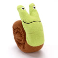 Reversible dog puzzle toy showing snail and stick configurations with hidden food holes