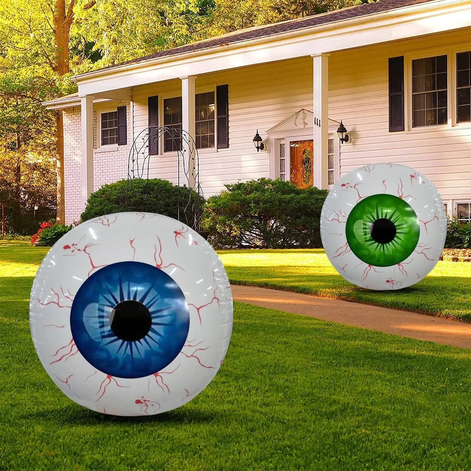 Green Halloween eyeball balloon inflatable with red bloodshot pattern design