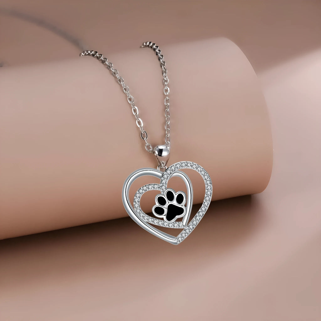 Women's necklace with dog paw print pendant on copper cross chain, heart-themed electroplated finish