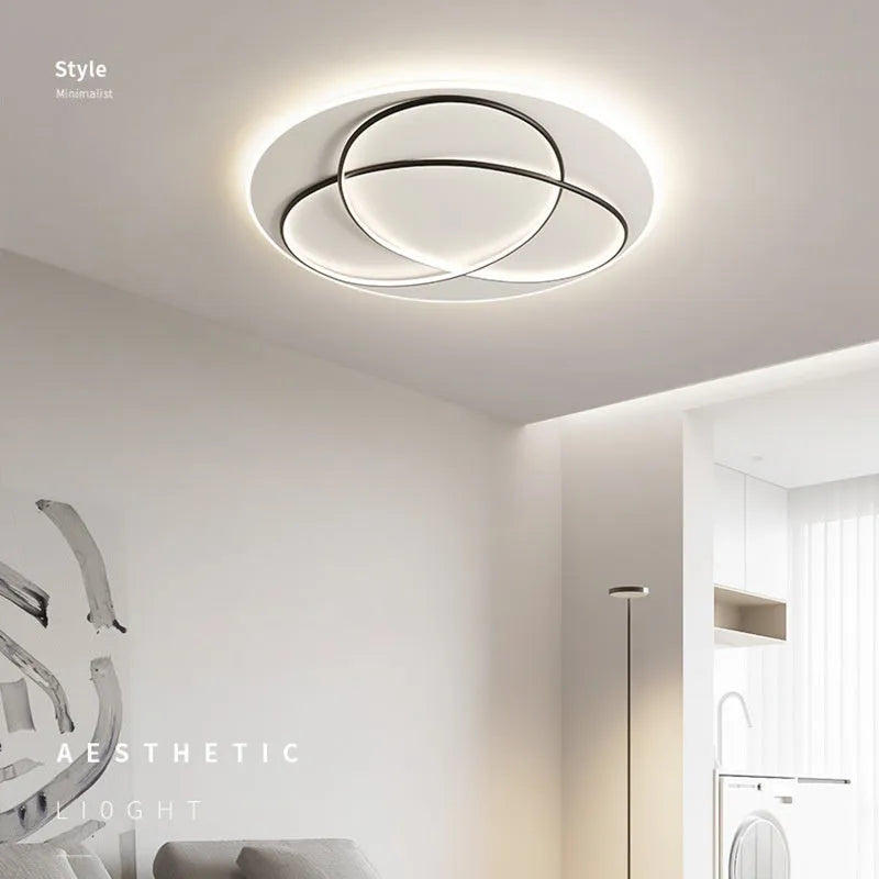 Clover LED ceiling lamp 61W 50cm black finish with warm white light in a modern living room