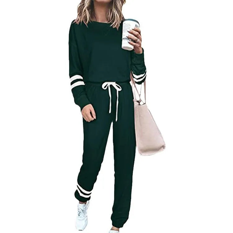 Women's plus size loose-fitting casual suit set in a solid colour with half-length sleeves.