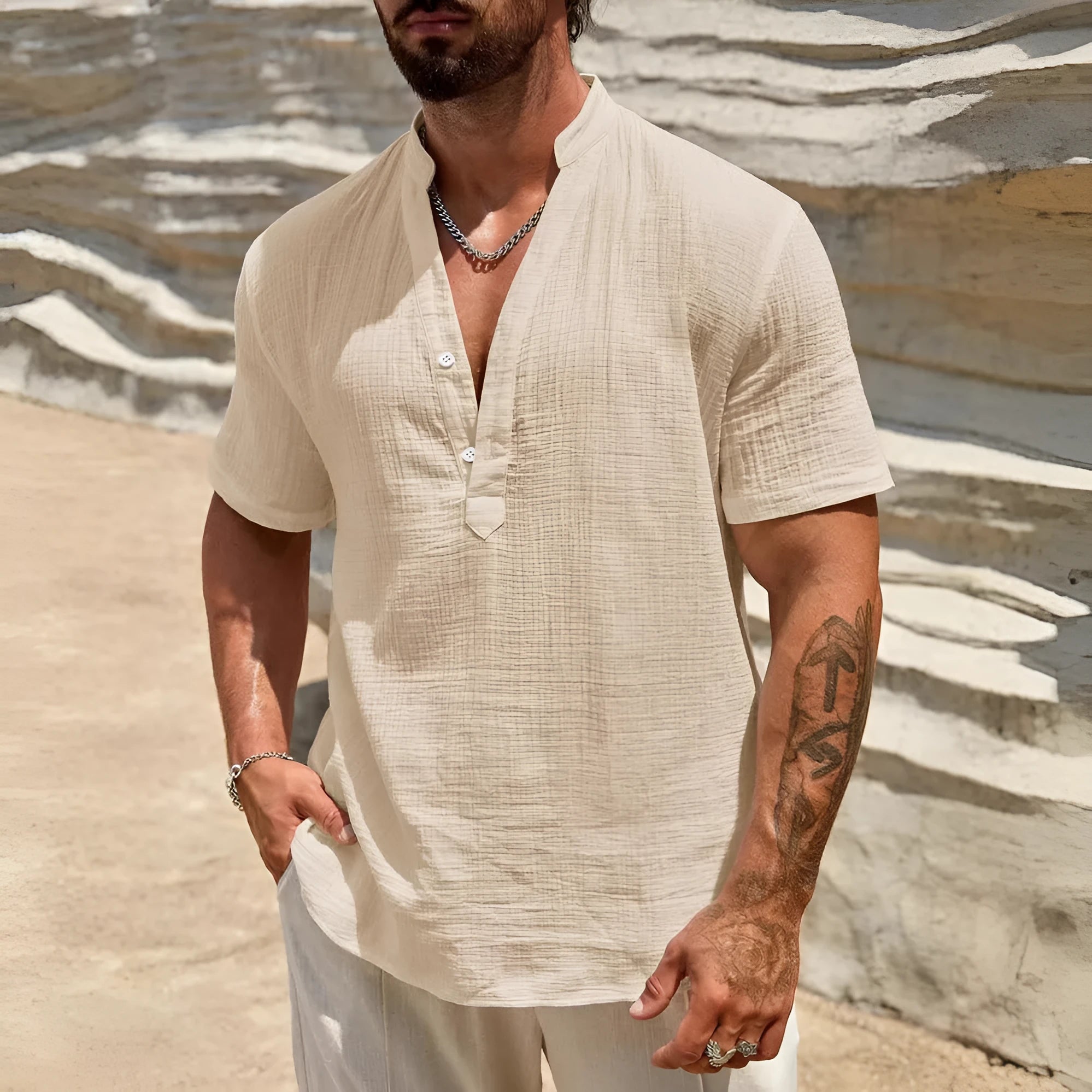 Men's solid colour stand collar short-sleeved shirt laid flat.