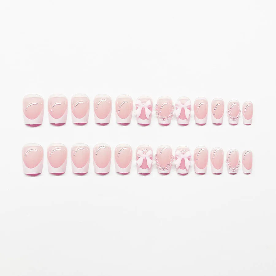 Short French manicure nail art set with multiple patterns including tulip, bow, starry sky and leopard print designs