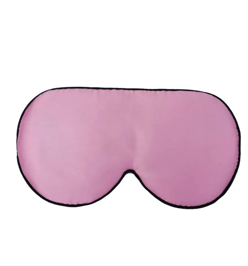Double-sided mulberry silk eye mask in champagne colour with embroidered print.