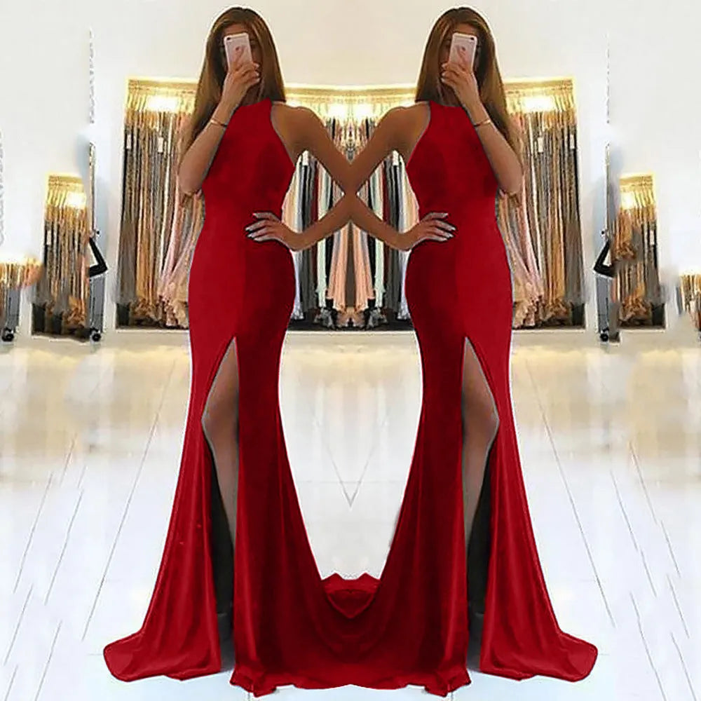 Red long knit evening dress with hollow bust detail and a flowing high-waisted swing skirt on a model.
