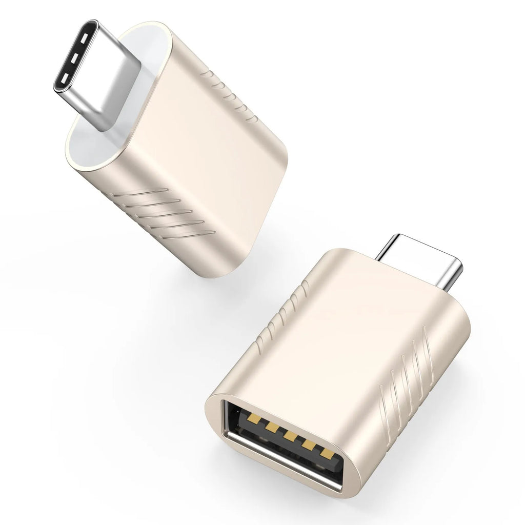 Zinc alloy USB data and charging converter adapter in champagne gold colour on a white background.