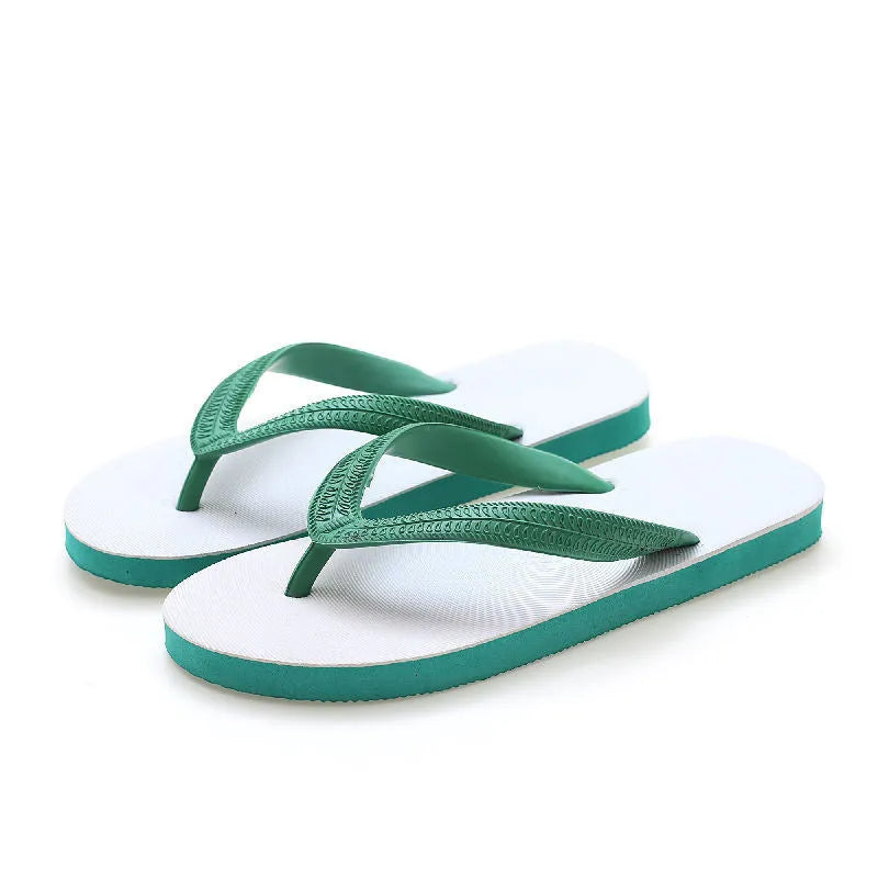 Green rubber flip-flop with fish label design, showing textured non-slip sole.
