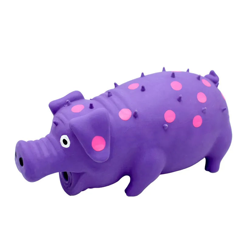 Blue pig-shaped latex dog chew toy with squeaker for aggressive chewers and teeth cleaning