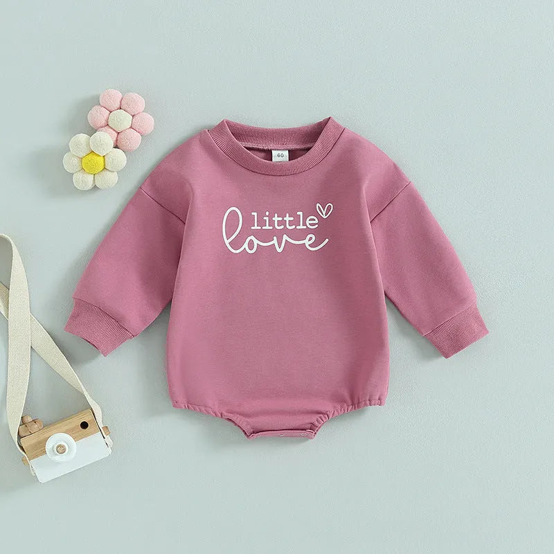 Girls' long-sleeved cotton top with letter flower print in apricot, hide hook closure, front view