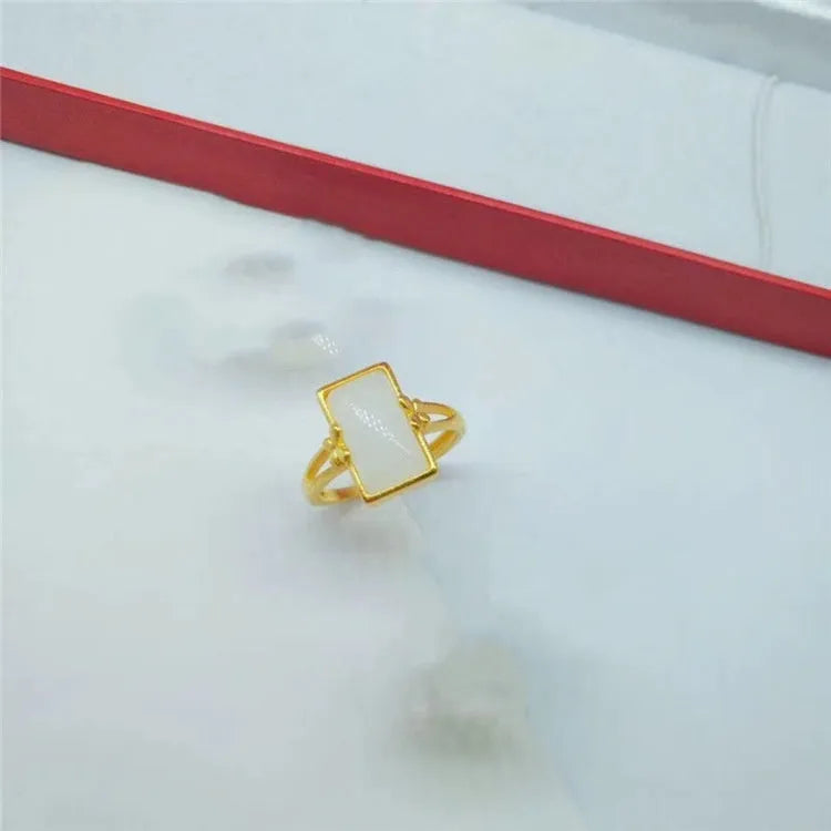 Brass gold-plated adjustable ring with long artificial gemstone in green, white, or black colour option