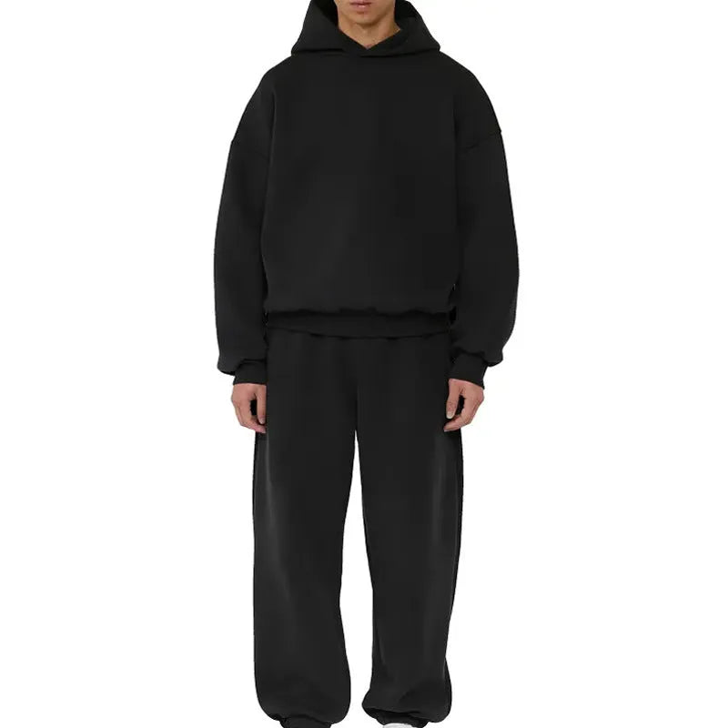 Men's grey fleece-lined pullover hoodie with wool lining shown in casual wear