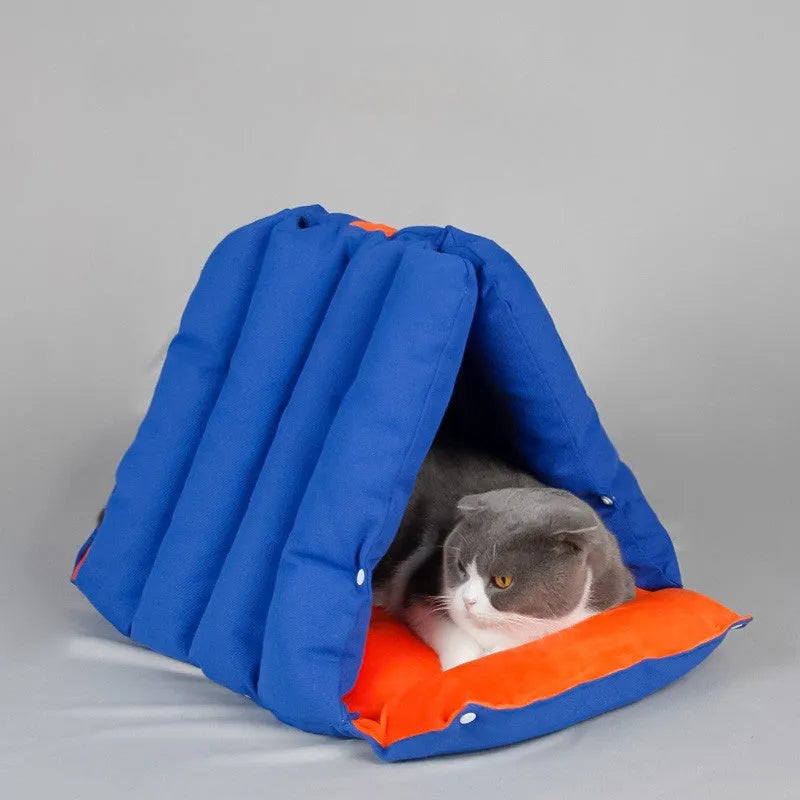 Blue triangular cat bed with removable cotton cover and connecting drill holes