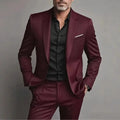 Men's slim fit casual two-piece suit set in black cotton blend fabric with coat and trousers on a hanger.
