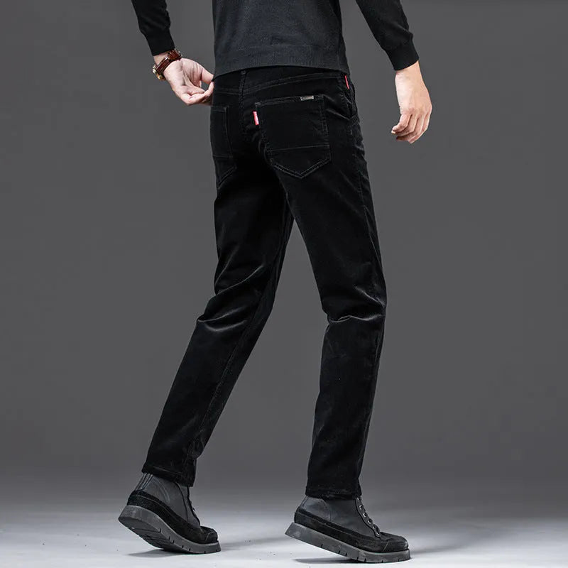 Straight slim-fit cotton corduroy trousers in brown, shown from front