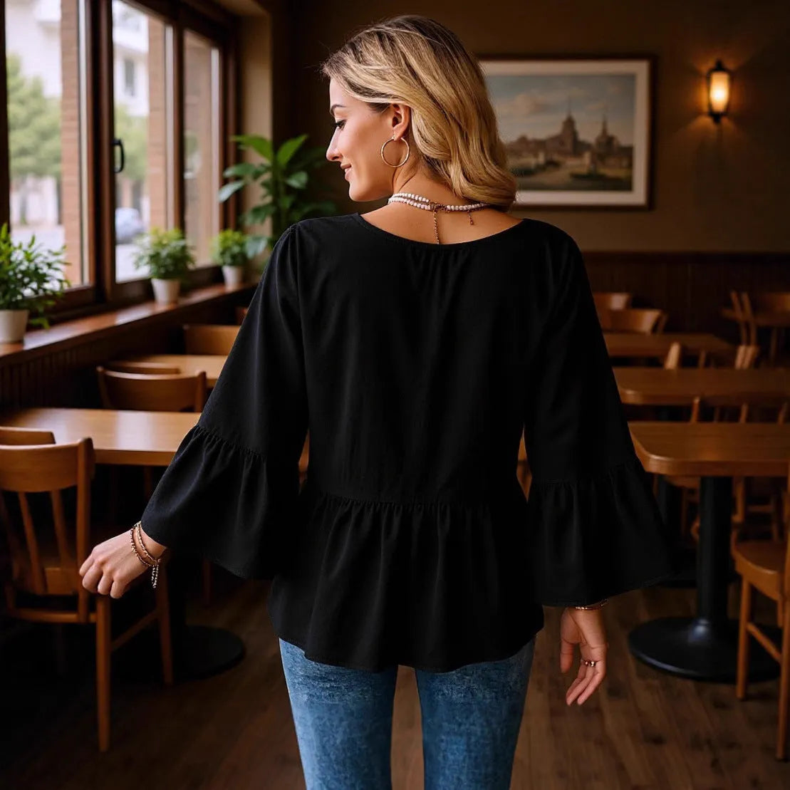 Women's solid black polyester shirt with seven-point flared three-quarter pleated sleeves