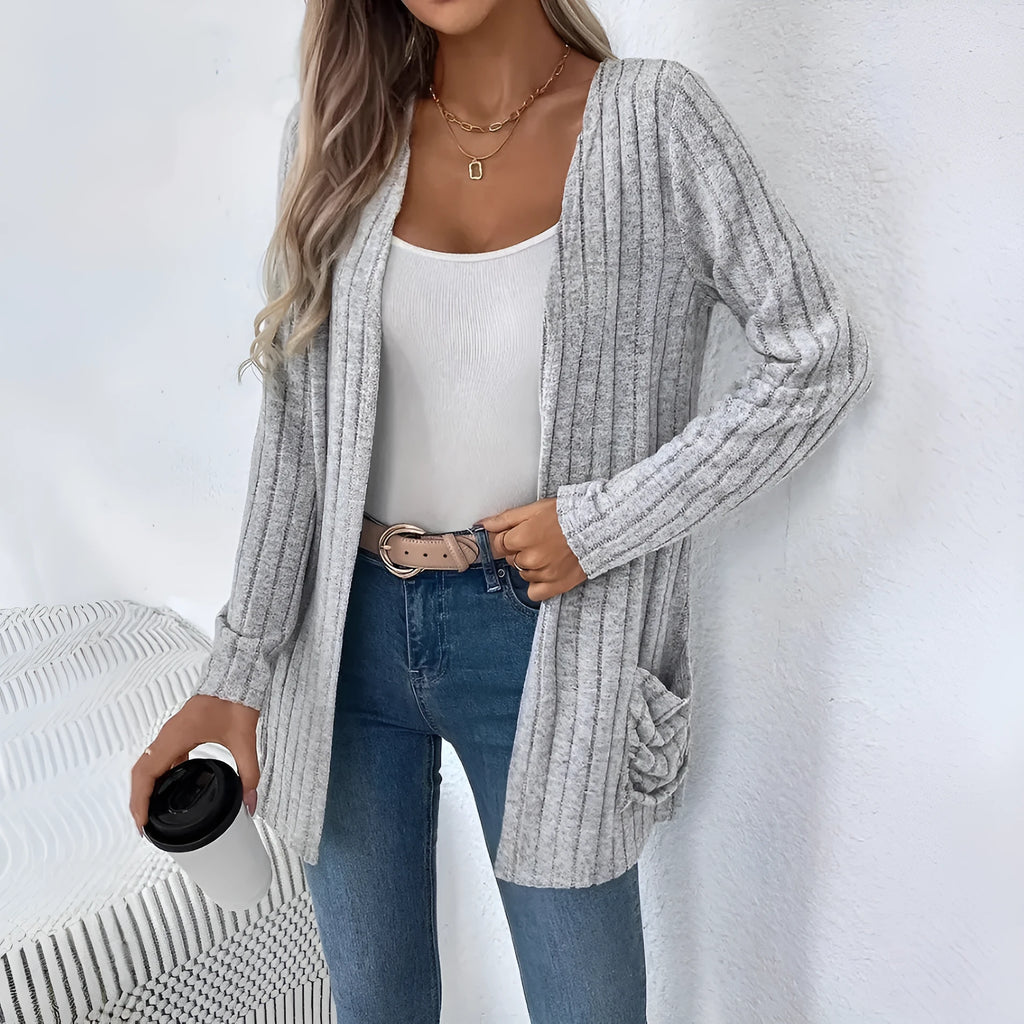 Solid colour long sleeve cardigan with front pockets in loose oversized fit