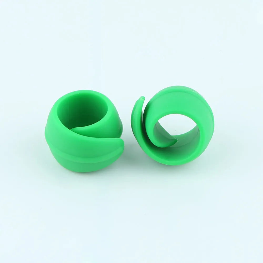 14 silicone sewing spool fixed clips in red, blue, orange, and green on a white background