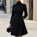 Women's black Bohemian style dress with stand collar, long sleeves, high waist, and zip fastening