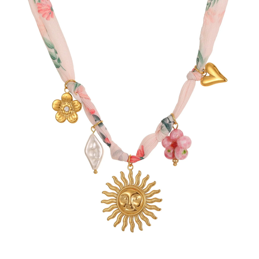 Gold plated stainless steel necklace with geometric sun pendant on adjustable 41-50cm chain