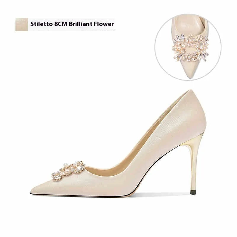 Pointed-toe crystal bridal high heel shoe with rhinestones on a cloth upper, shown with a cat heel and a stiletto heel option.