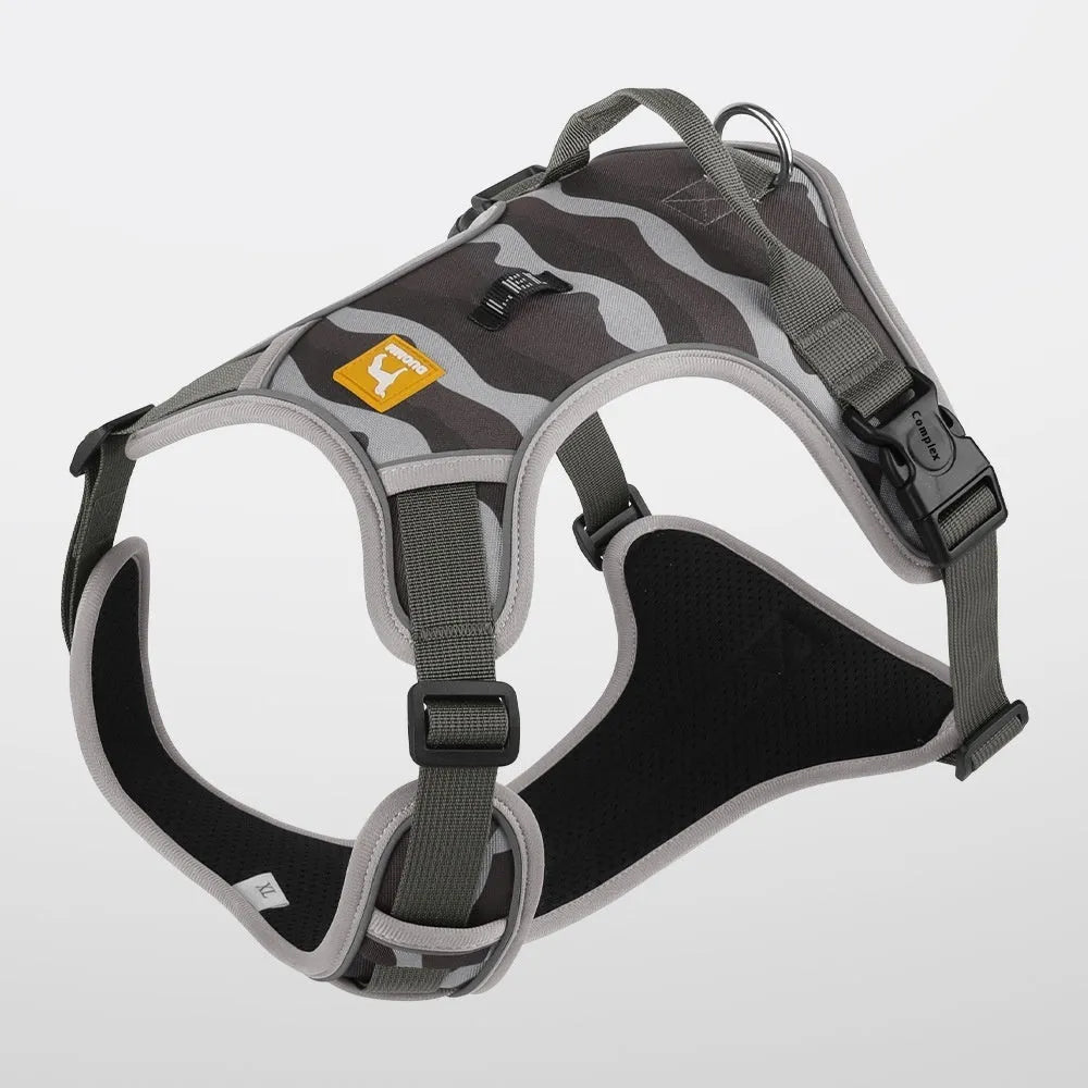 Orange reflective dog chest and back harness with hand-holding rope on a neutral background.