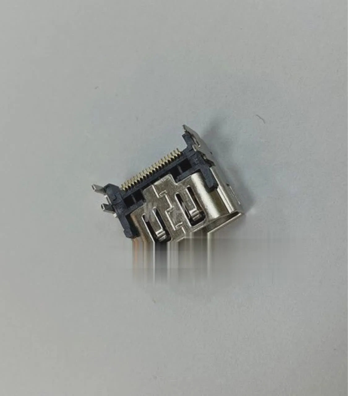 Silver metal HDMI interface socket component for game console accessories and electronic repairs