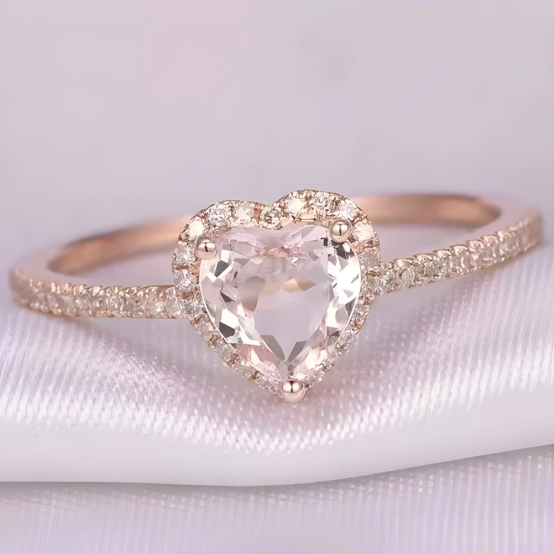 Women's heart-shaped crystal wedding ring with electroplated rose gold finish on white copper