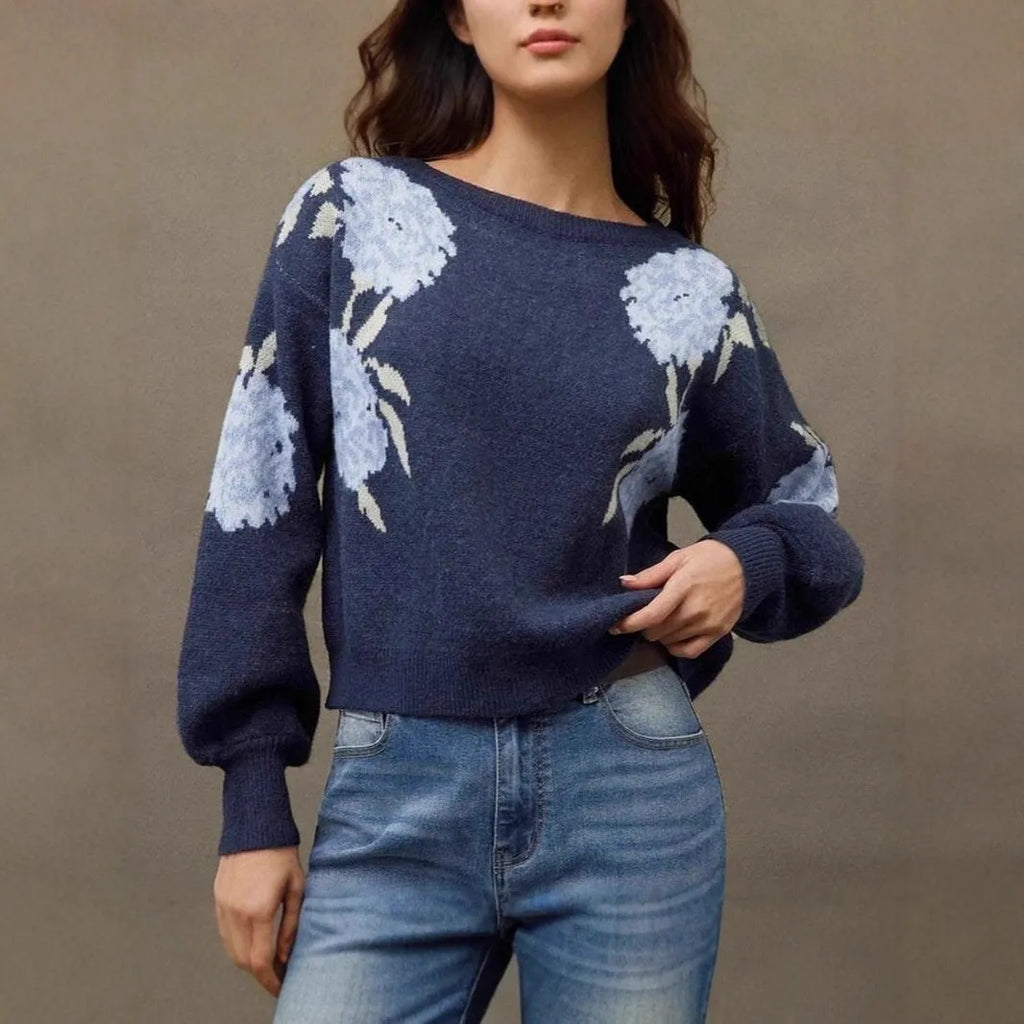 Sapphire blue women's loose pullover sweater with a detailed woven floral jacquard pattern and off-neck design.