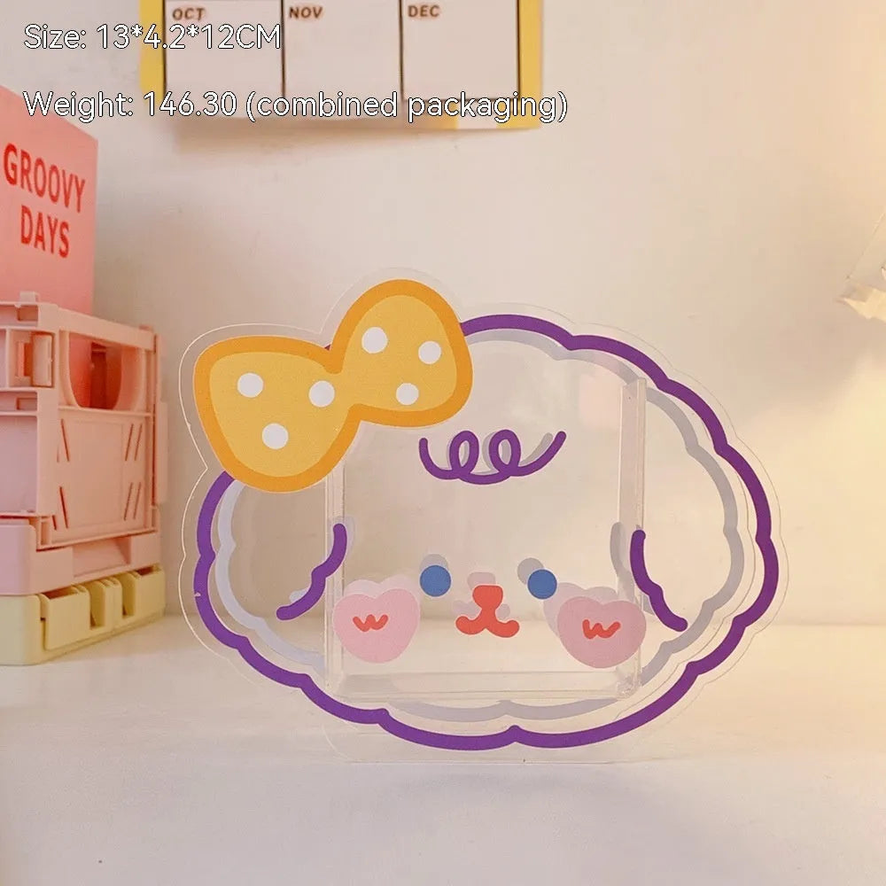 Clear square acrylic stationery storage box with lid in cute character design on desktop