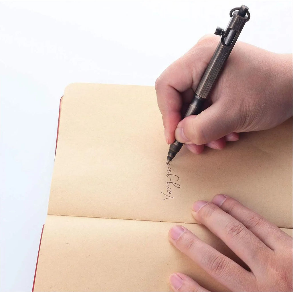 Brass tactical pen with hexagonal bolt design in natural brass colour or retro black finish
