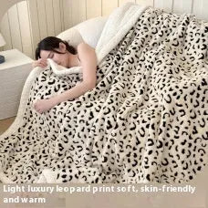 Double-layer cationic leopard jacquard taffeta blanket showing animal print pattern detail