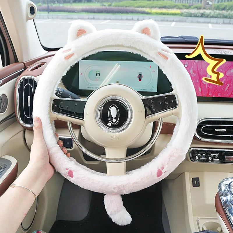 Plush winter steering wheel cover with cartoon embroidery, shown in 38cm size on a car steering wheel.