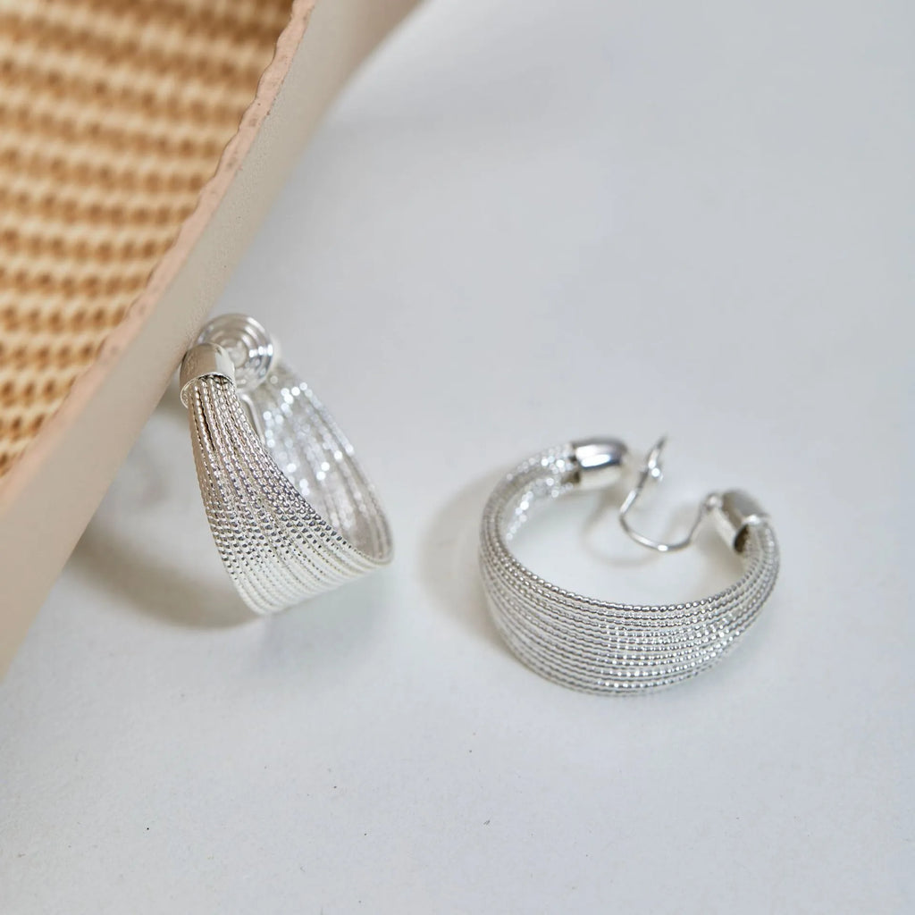 Geometric multi-layer copper earrings in silver or gold finish as stud or clip styles