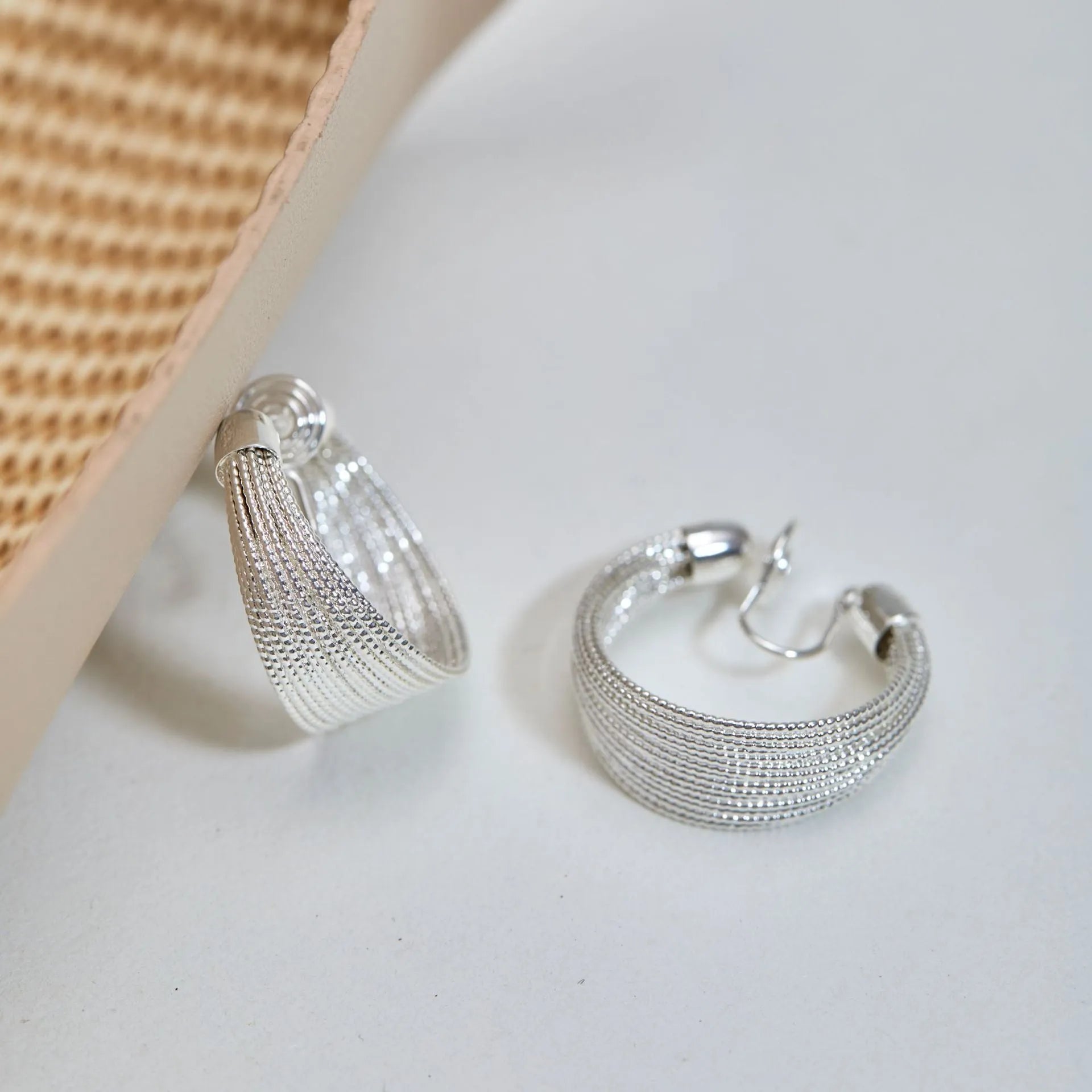 Geometric multi-layer copper earrings in silver or gold finish as stud or clip styles